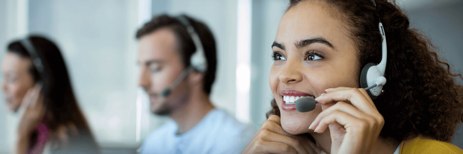 Employee offering professional assistance via telephone